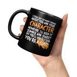 NEW_Youre_A_Cunt_Funny_Story_Mug_-_Offe_11oz_Black_LH_Model_Mockup.png