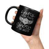 New_Lawful_On_The_Streets_Chaotic_In_The_11oz_Black_LH_Model_Mockup.png