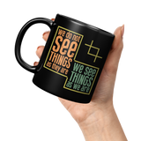 New_We_Do_Not_See_Things_As_They_Are_We__11oz_Black_LH_Model_Mockup.png