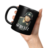Schultz_New_Mug_11oz_Black_LH_Model_Mockup.png_15653177